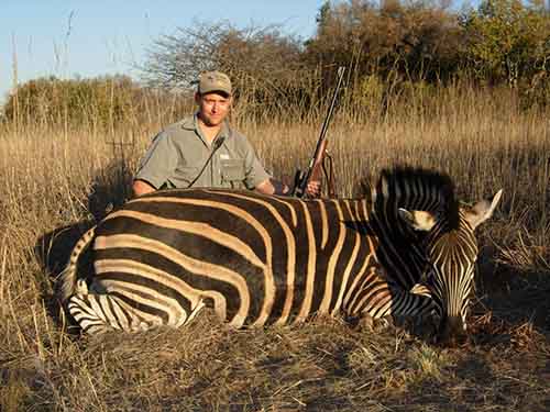 Gayne C Young With His Trophy Zebra